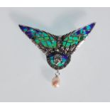 A ladies silver and plique a jour brooch in the form of a bird. Marcasites decorate the edge of