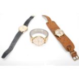 A group of four vintage gentleman's wrist watches