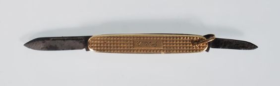 A stamped 14ct gold cased folding pocket fruit knife having a filled gold case with geometric