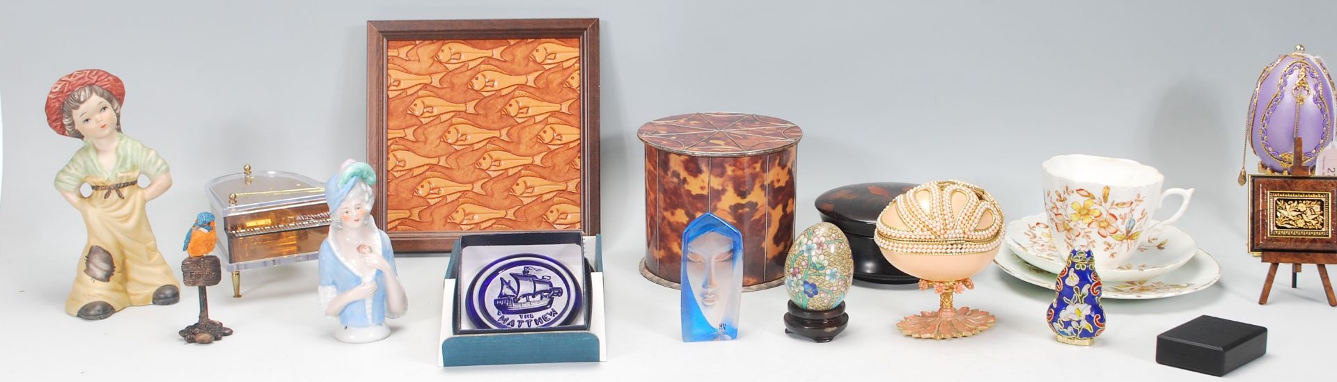 A selection of ornamental items to include a cloisonne egg and scent bottle, faux tortoise shell tea