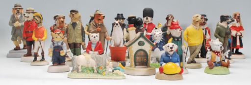 A collection of Robert Harrop ceramic collectable dog figurines to include mostly Country Companions