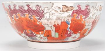 A 19th Century English ceramic centrepiece fruit bowl having transfer printed rim decoration in