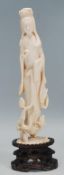 A 19th Century Chinese carved ivory statue / figurine in the form of Guanyin, the Buddhist goddess