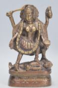 A 20th Century Hindu bronze figural statue depicting the deity Shiva Nataraja with four arms