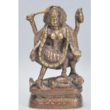 A 20th Century Hindu bronze figural statue depicting the deity Shiva Nataraja with four arms