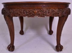 A pair of Anglo Colonial Burmese carved hardwood console hall tables. Each of demi lune ( half