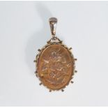 A silver hallmarked 19th Century Victorian locket of oval form having engraved floral decoration,