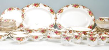 A Royal Albert Old Country Roses pattern part coffee and dinner service to include large plates,