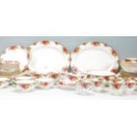 A Royal Albert Old Country Roses pattern part coffee and dinner service to include large plates,