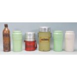 A mixed group of five vintage 20th Century Thermoses in varying sizes and colours to include three