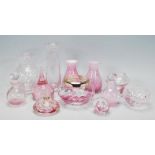 A good collection of 20th Century Caithness glassware, mostly pink in colour to include a matching