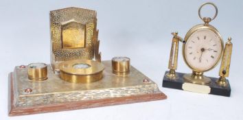 A good early 20th Century brass desk tidy having a