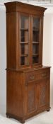 A Victorian 19th century walnut secretaire bureau bookcase. Raised on plinth base with cupboard