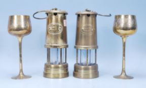 Two 20th Century brass miners lamps each with oval plaques reading 'Hockley Lamp & Limelight