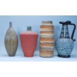 A collection of vintage retro art pottery to include a West German vase having banded decoration,