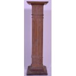 An early 20th Century oak pedestal / jardiniere of