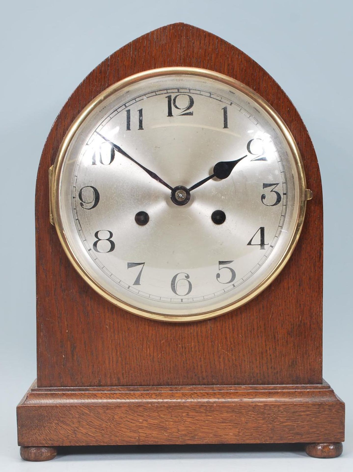 An early 20th century mahogany cased English bracket clock having inset 8 day brass movement. The