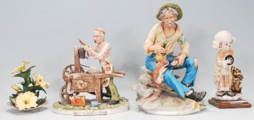 A group of three 20th Century Capodimonte figurines to include a Giacomo Leatti knife sharpener