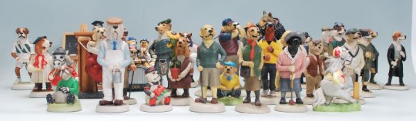 A collection of Robert Harrop ceramic collectable dog figurines to include mostly Country Companions