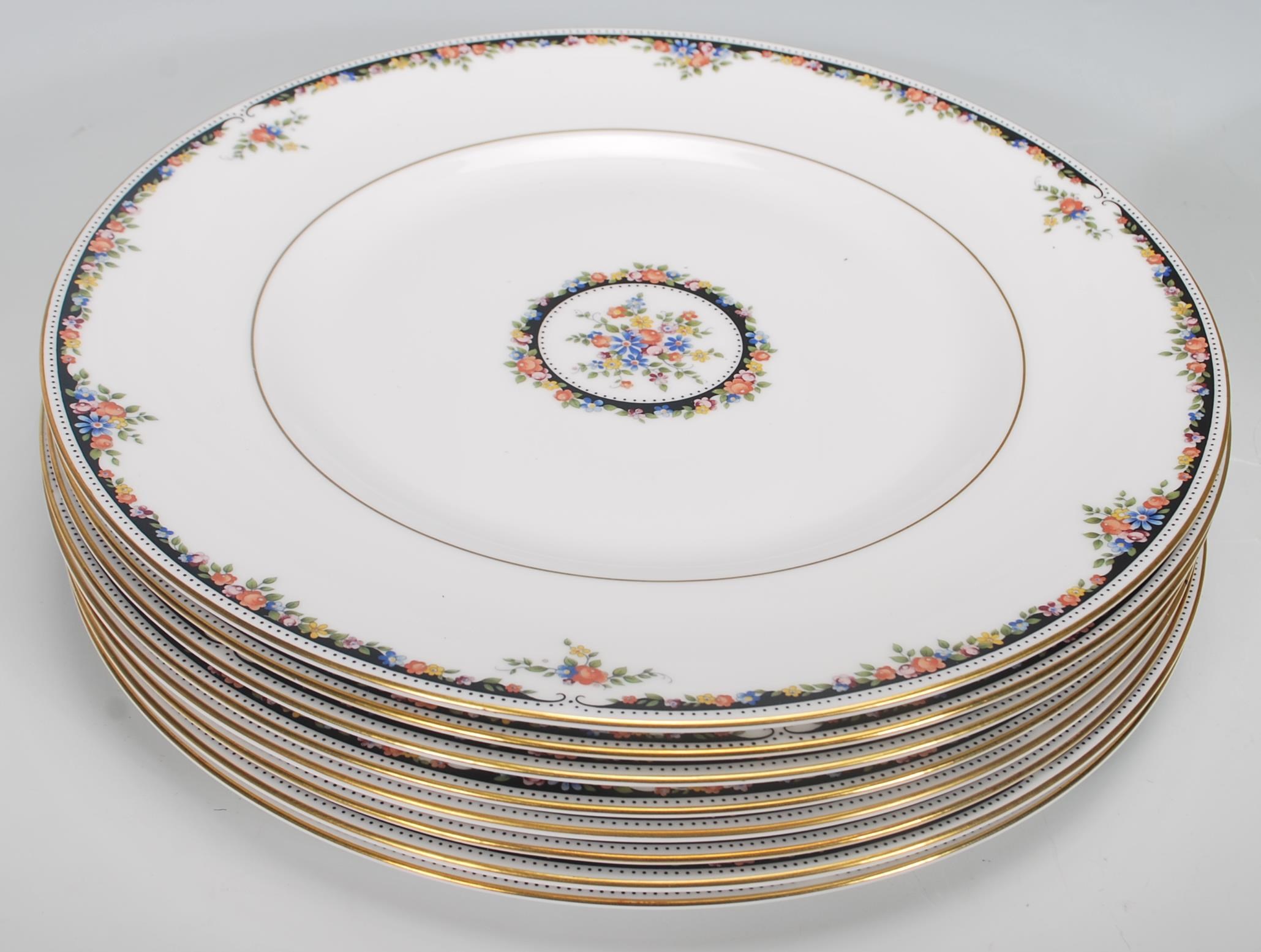 A Wedgwood Bone China dinner service in the Osborne R 4699 pattern