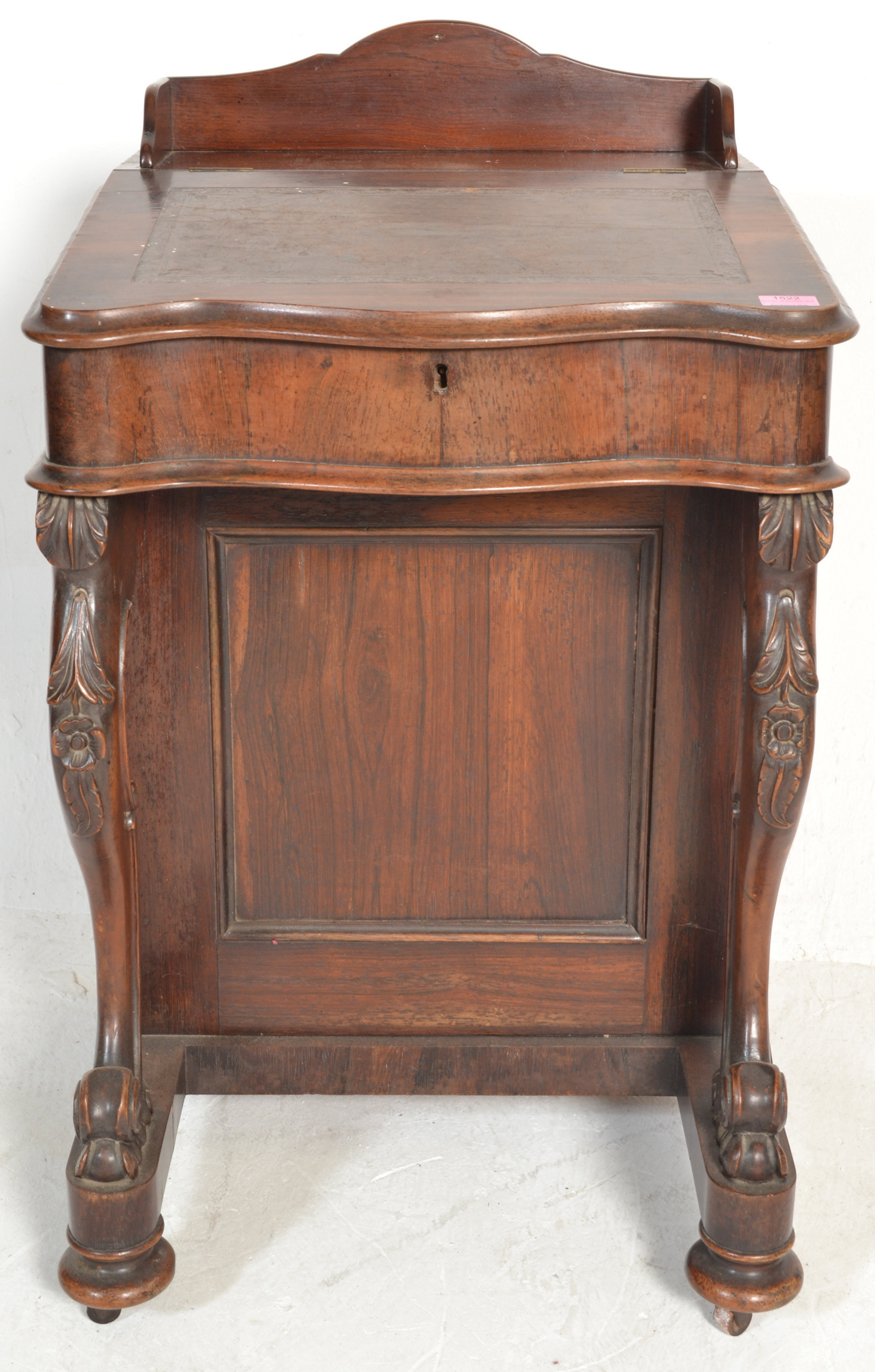 A Victorian 19th century rosewood davenport desk being raised on scroll supports with carved - Image 2 of 6