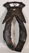 A late 19th / early 20th Century antique shire horse harness saddle pad, upholstered in black