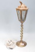 A vintage 20th Century brass and copper table lamp in the form of a street lantern with textured