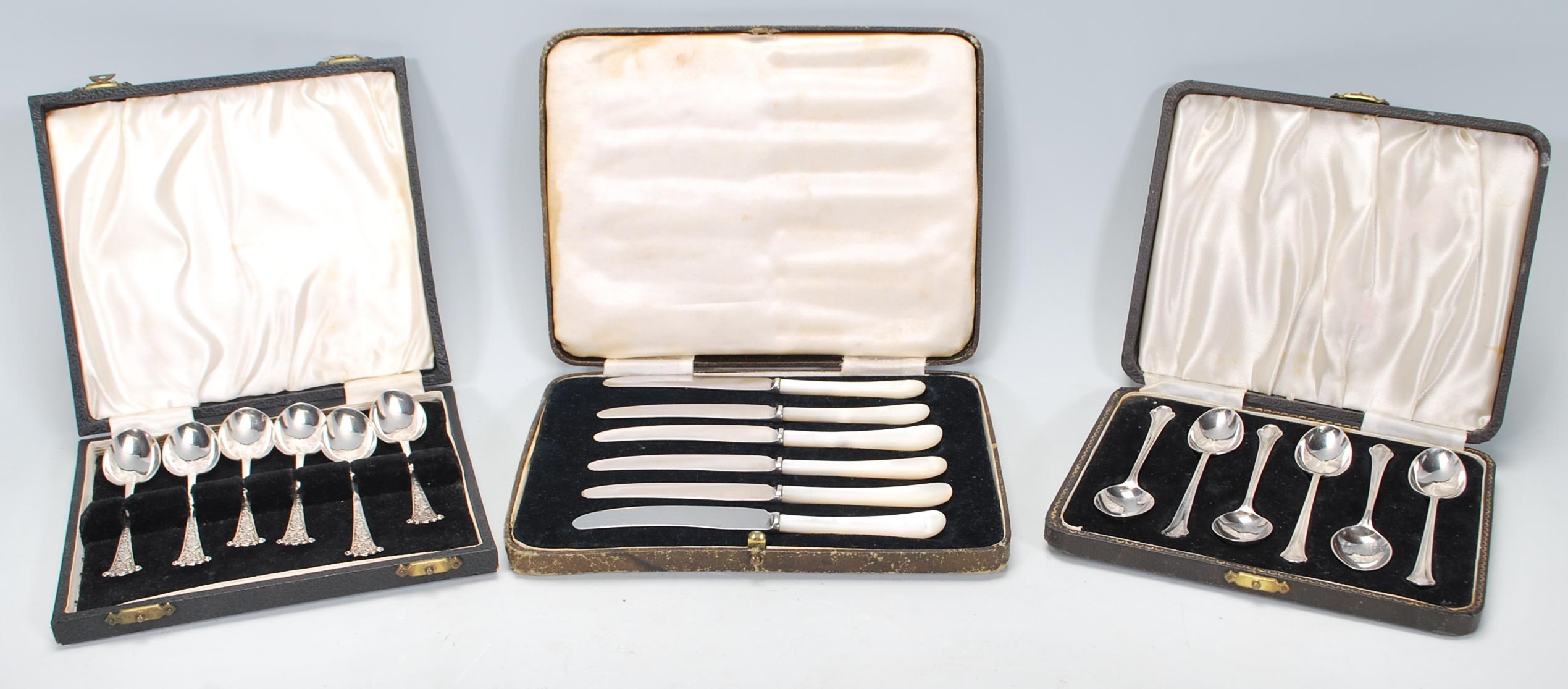 Two boxed sets of six silver hallmarked tea spoons to include a set of R W Hewett & Co spoons having