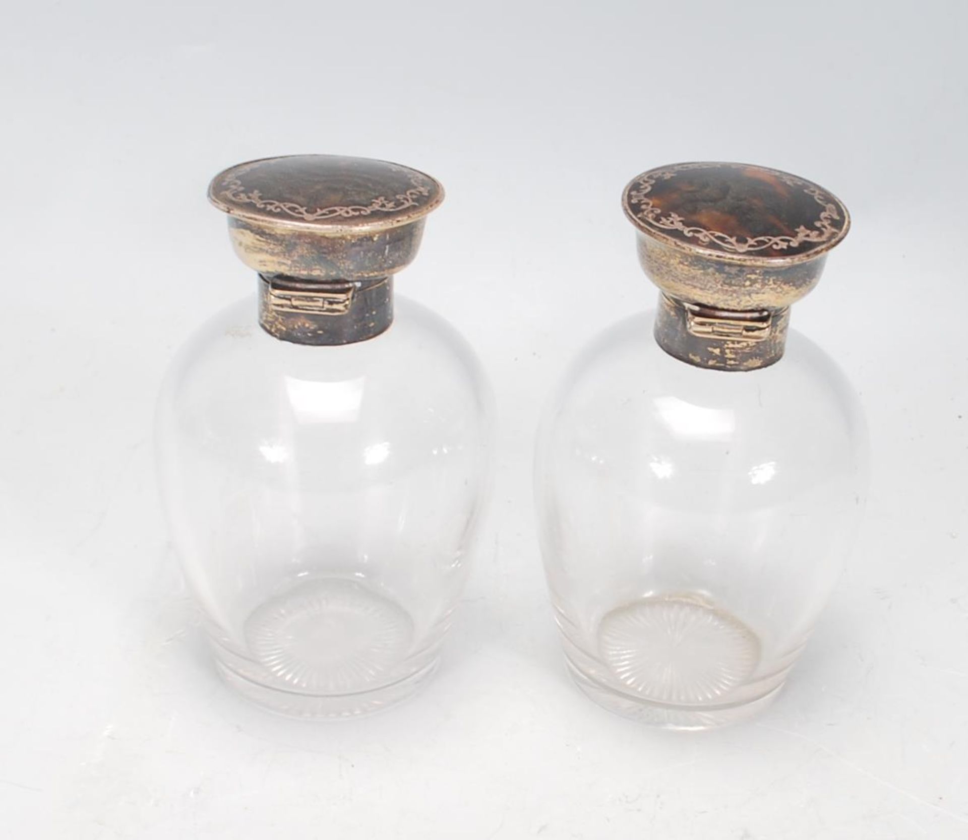 A pair of silver topped dressing table perfume bottles, each lid of round form set with tortoise - Image 3 of 5