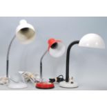 A good collection of three mid 20th century vintage desk / table lamps having gooseneck and circular