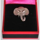 An unusual stamped 925 silver ladies ring in the form of an elephant. Cubic Zirconia surround the