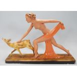 An early 20th century 1920's / 1930's art deco chalkware sculpture depicting a nude female figure