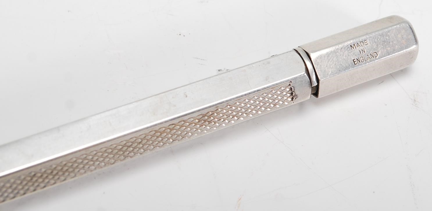 A silver hallmarked propelling pencil by Johnson Matthey & Co, London assay, dating to 1946, gross - Image 5 of 6