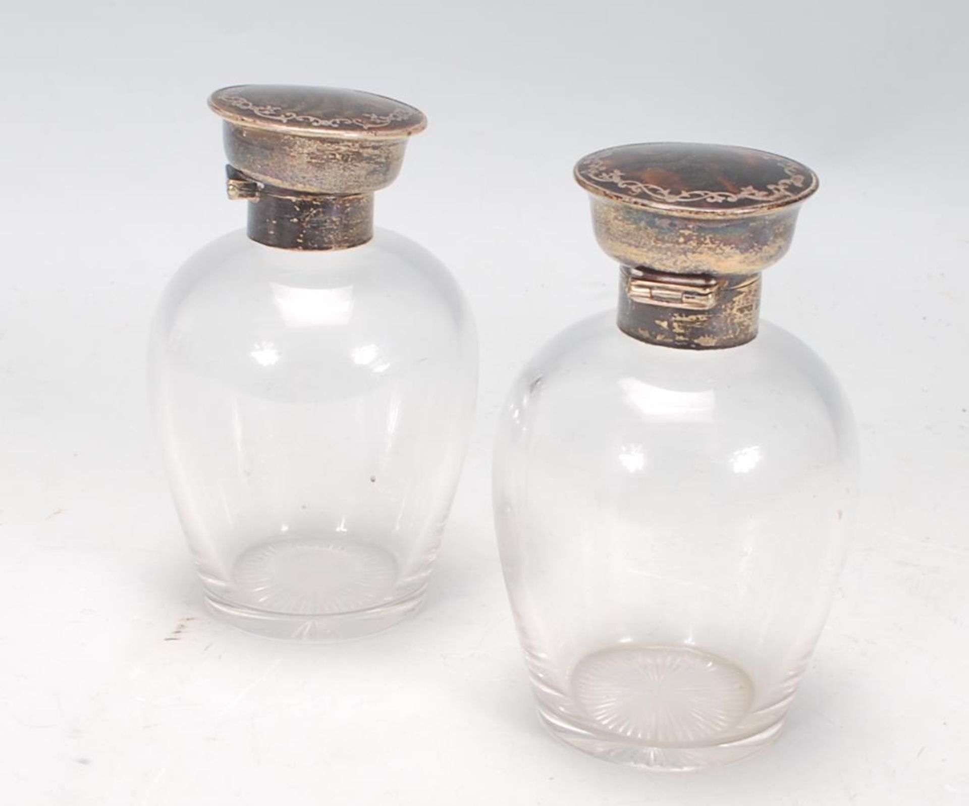 A pair of silver topped dressing table perfume bottles, each lid of round form set with tortoise - Image 5 of 5