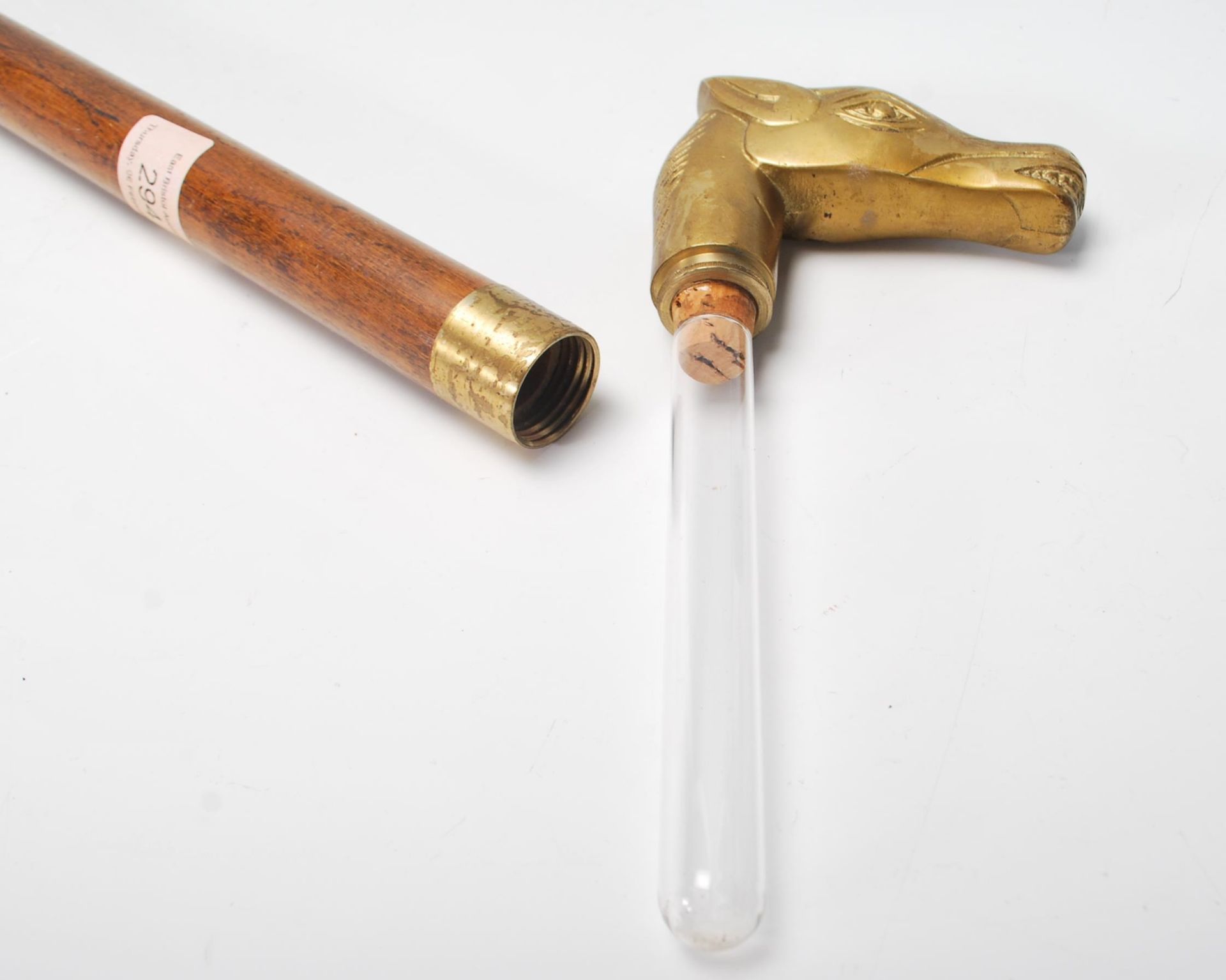 A 20th Century walking stick cane having a tapering wooden shaft with a brass handle to the top - Bild 7 aus 8