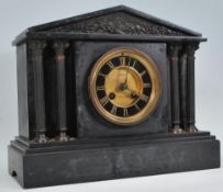A Victorian 19th century marble & slate mantel clock. Inset brass 8 day movement with gilded chapter