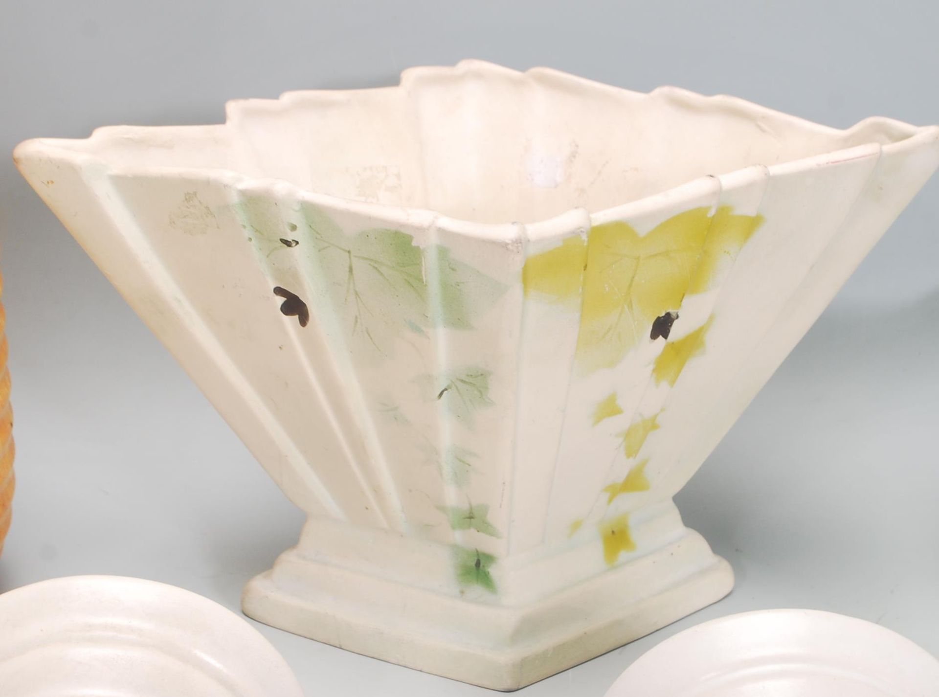 A small group of early 20th Century Art Deco ceramics to include a mint green table vase, a small - Image 3 of 6