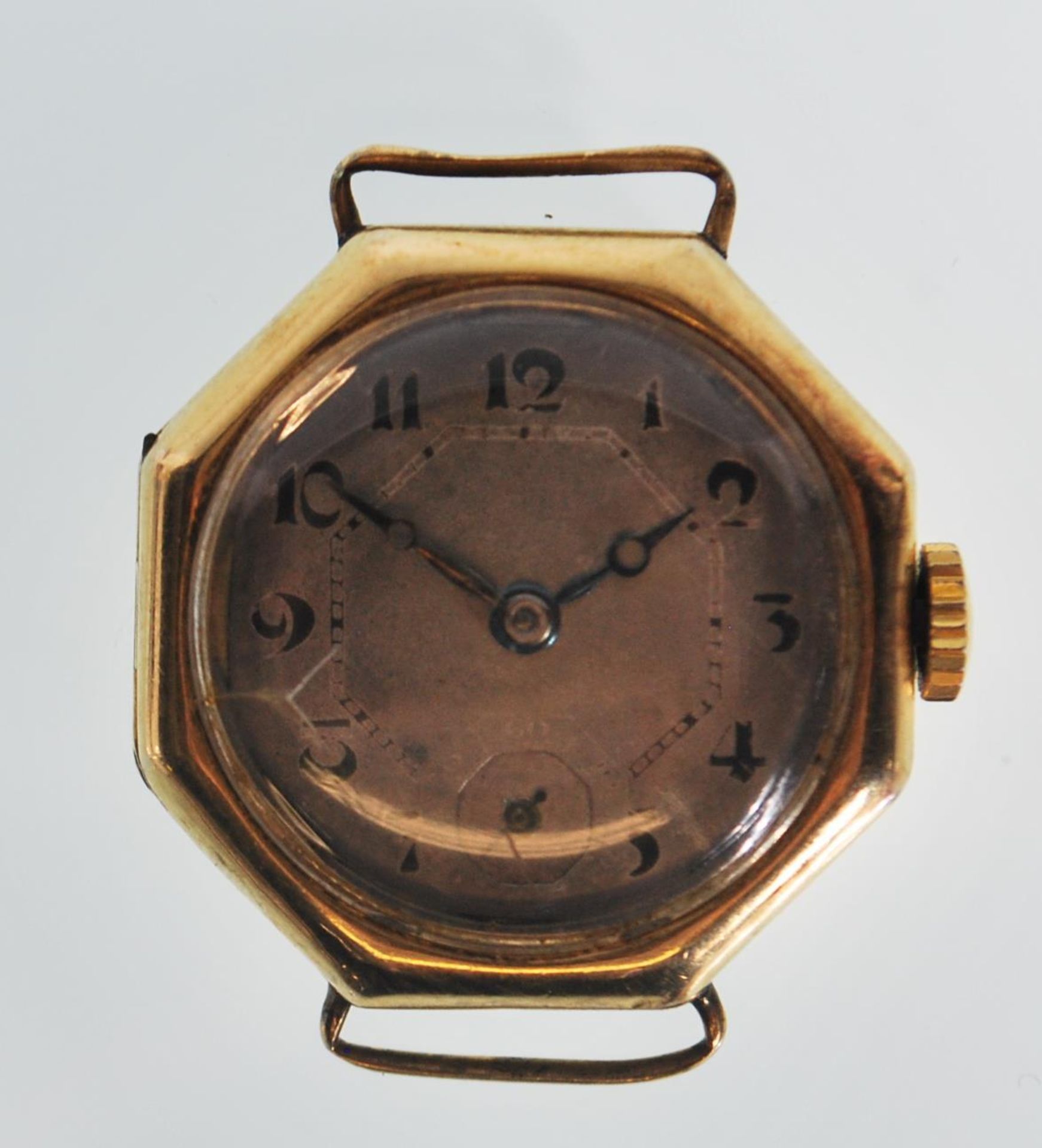 An early 20th Century 18ct gold hallmarked ladies cocktail watch, octagonal face with Arabic numeral