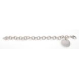 A 925 silver Tiffany & Co pendant and bracelet chain of curb link form united with lobster clasp.