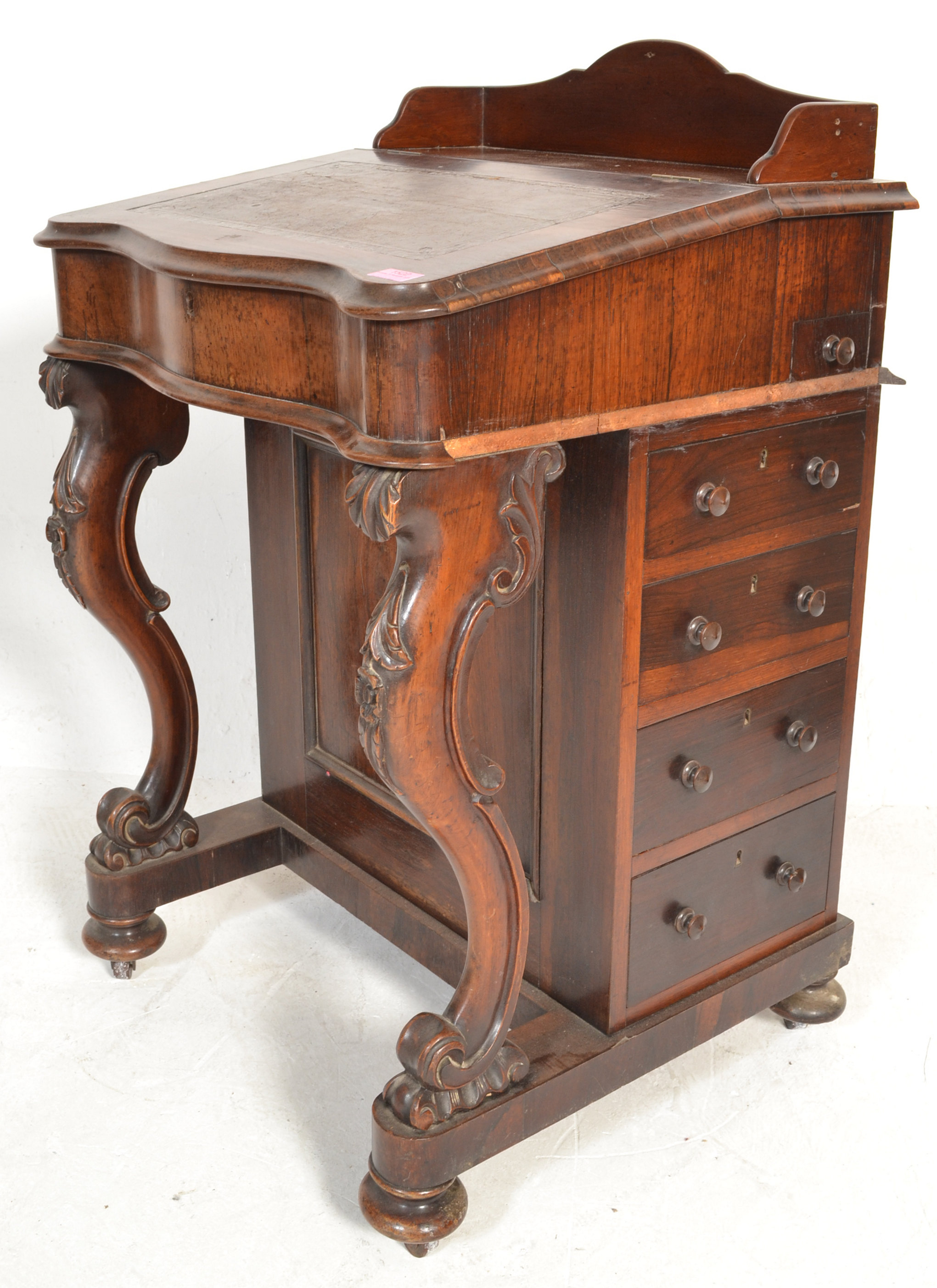 A Victorian 19th century rosewood davenport desk being raised on scroll supports with carved - Image 4 of 6