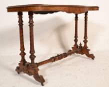 A Victorian 19th century walnut serpentine fronted writing table desk. Raised on turned legs