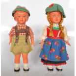 Two vintage mid 20th Century souvenir German / Austrian wind up toy dolls dressed in traditional