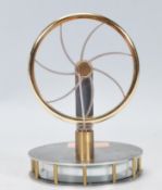 A desktop miniature steam engine having a round ch