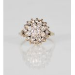 An English hallmarked 9ct yellow gold antique style ladies cluster ring set with a central round