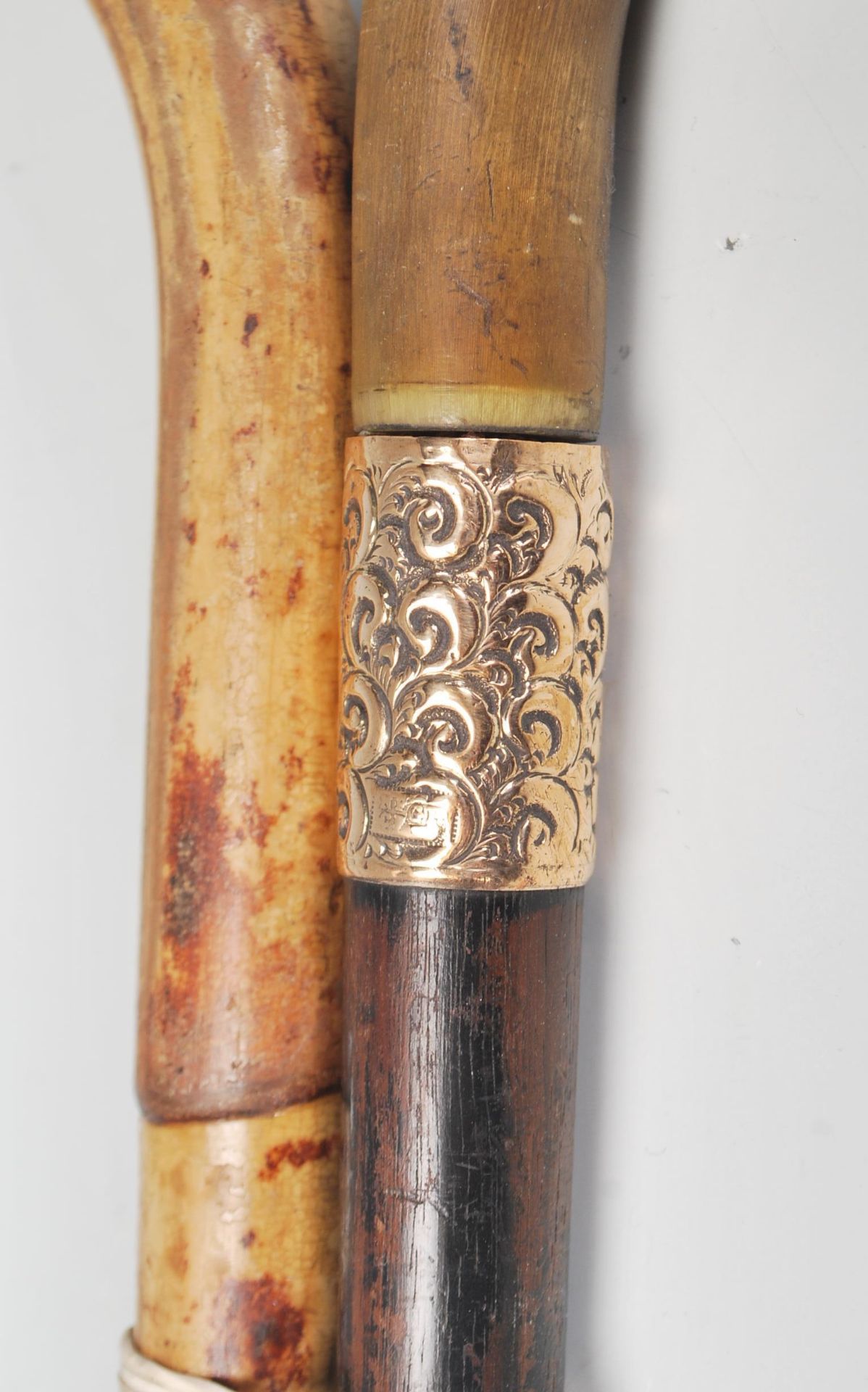 A pair of 20th century wooden walking sticks havin - Image 4 of 9