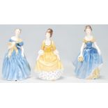 A group of three Royal Doulton lady figurines to include Adrienne HN 2304, Melanie HN 2271 and a