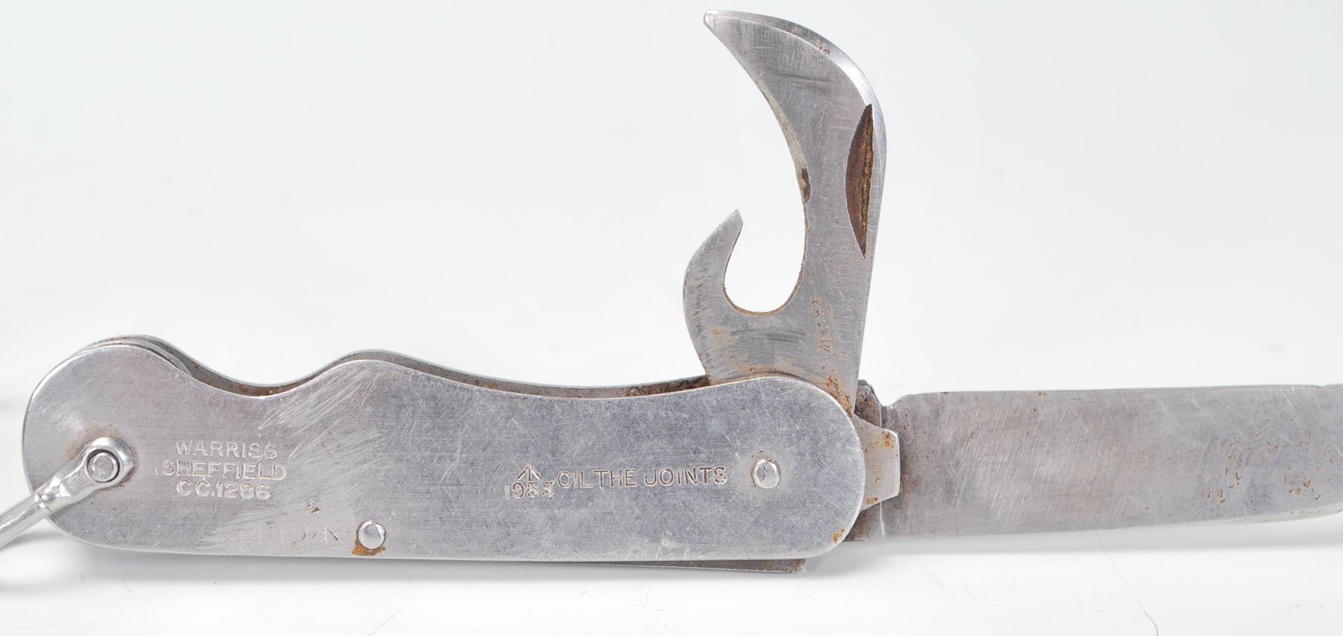 A military issue Warriss of Sheffield pocket knife marked 1953 with broad arrow and Oil the - Image 6 of 9