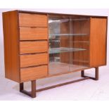 A vintage retro mid 20th century teak wood sideboard display cabinet having a central display