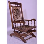 A 19th Century Victorian mahogany aesthetic movement Boston Rocker - American Rocking chair.