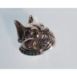 A silver brooch in the form of a face of a Bulldog. Sterling silver. The eyes are set with rubies